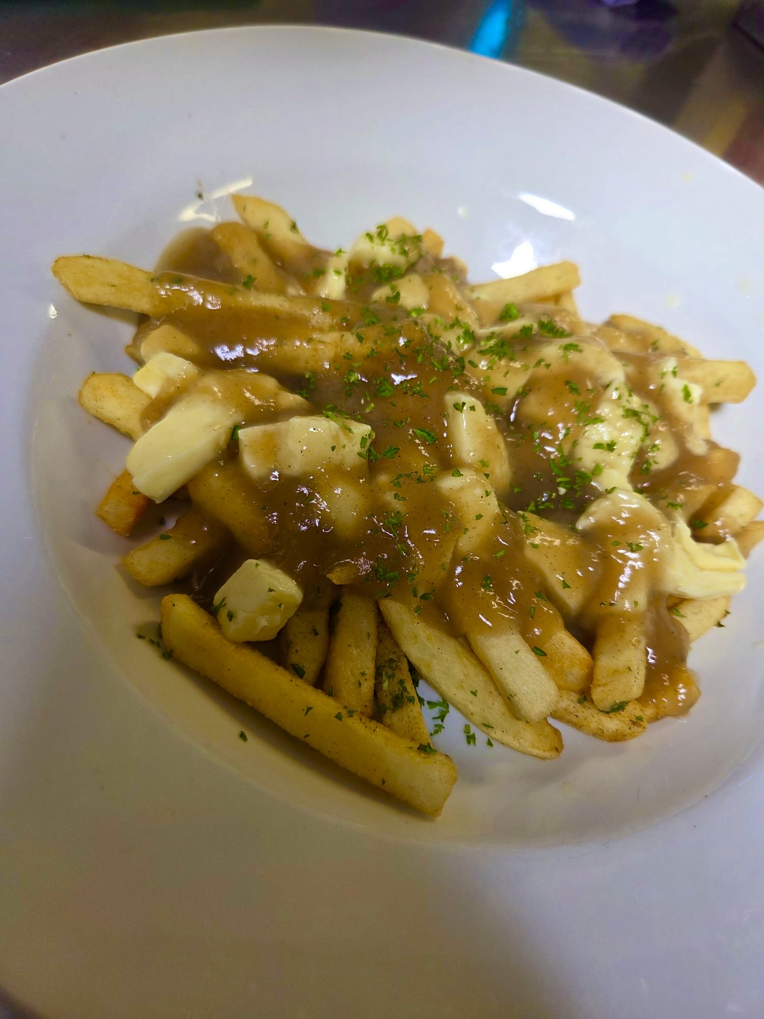 Poutine — chips, cheese curds and gravy